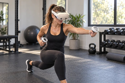 A woman doing a VR fitness workout on a Meta Quest 3 in a bright home gym