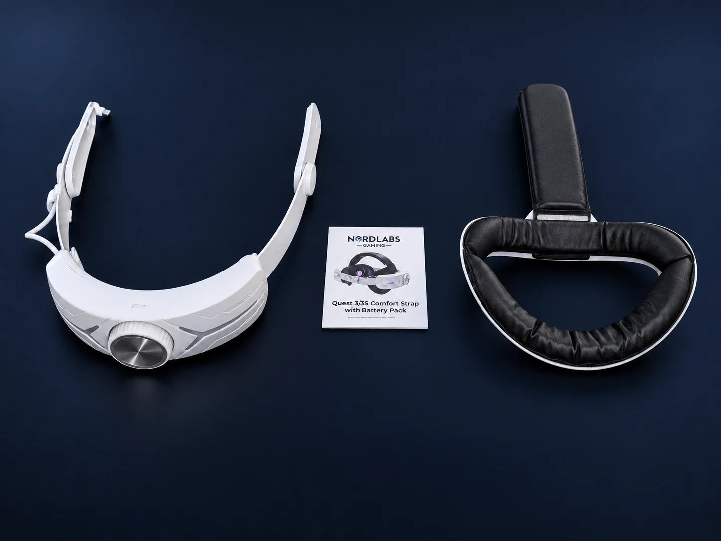 Comfort Strap with built-in battery pack, padded back-of-head support with top strap, and quick-start guide