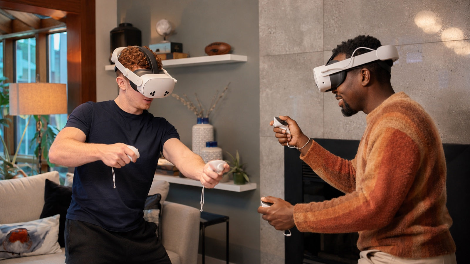 Two players gaming comfortably in NordLabs battery straps in a living room